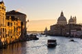 Grand Canal with Santa Maria della Salute at sunrise in Venice Royalty Free Stock Photo