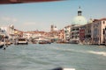 The Grand Canal of Venice gracefully winds through the heart of this romantic city, adorned with colorful buildings and bustling Royalty Free Stock Photo