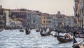 The Grand Canal in Venice, Italy. Gondolas with tourists, boats and water buses, aka vaporetto Royalty Free Stock Photo