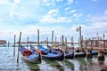 Grand canal in Venice, Piazza San Marco. On the background the island San Giorgio. Scenic cityscape with gondolas