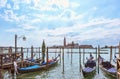 Grand canal in Venice, Piazza San Marco, in the background the island San Giorgio. Scenic moody cityscape with gondolas Royalty Free Stock Photo