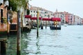 Grand Canal and wooden poles in Venice, Italy Royalty Free Stock Photo