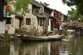 Boatman on Grand Canal at Zhouzhuang, China