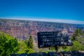 Grand Canyon,Arizona USA, JUNE, 14, 2018: Outdoor view of informative sign of roaring spring canyon in a wooden