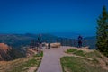 Grand Canyon,Arizona USA, JUNE, 14, 2018: People is standing on a steep cliff enjoying the view of Grand Canyon on a Royalty Free Stock Photo