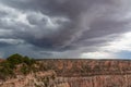 Grand Canyon - Dark clouds emerging to rain storm seen from the Bright Angel Point at South Rim, Arizona, USA Royalty Free Stock Photo