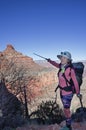 Grand Canyon Hiker Points At The Battleship Royalty Free Stock Photo