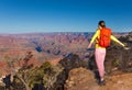 Grand canyon and hiker young woman portait Royalty Free Stock Photo