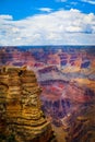 The Grand Canyon - Magnificent vertical view of Colorado River running through the depths with late afternoon sun highlighting the Royalty Free Stock Photo