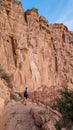 Grand Canyon - Man hiking along Bright Angel trail with panoramic aerial overlook of South Rim of Grand Canyon, Arizona, USA Royalty Free Stock Photo