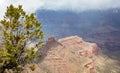 Grand Canyon, Arizona, USA. Overlook of the red rocks, cloudy sky background