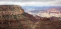 Grand Canyon, Arizona, USA. Overlook of the red rocks, cloudy sky background