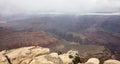 Grand Canyon National park Arizona USA. Panoramic view of lunar landscape fog on red rock formation Royalty Free Stock Photo