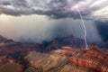 Grand Canyon Thunderstorm with Lightning Bolt Royalty Free Stock Photo