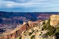 Grand Canyon, view from Lipan Point. Hill, rocks in foreground; canyon, north rim and river beyond. Royalty Free Stock Photo