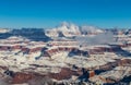 Grand Canyon, north rim wall. Snow, clouds, blue sky. Royalty Free Stock Photo