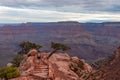 Grand Canyon - Woman with panoramic aerial view from Ooh Ahh point on South Kaibab hiking trail at South Rim, Arizona, USA Royalty Free Stock Photo