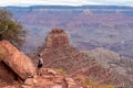 Grand Canyon - Woman with panoramic aerial view from Ooh Ahh point on South Kaibab hiking trail at South Rim, Arizona, USA Royalty Free Stock Photo