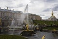 The Grand Cascade and Samson Fountain golden sculpture of Samson tearing open the jaws of a lion with the palace in the back Royalty Free Stock Photo