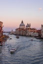 Grand channel in Venice, followed by the ships, sunset and Basilica della Salute