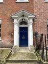 Grand entrance with stepping stone, door with columns Royalty Free Stock Photo