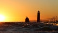 Grand Haven South Pier Lighthouse at sunset Royalty Free Stock Photo