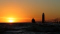 Grand Haven South Pier Lighthouse at sunset Royalty Free Stock Photo