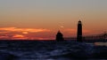 Grand Haven South Pier Lighthouse at sunset Royalty Free Stock Photo