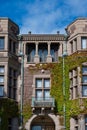 grand historic building with ivy-covered facade.. Royalty Free Stock Photo