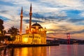 A Grand Imperial Mosque of Istanbul and the Bosphorus bridge in the night lights Royalty Free Stock Photo