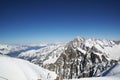 Grand Jorasses and freeriders, extreme ski, Aiguille du Midi, French Alps Royalty Free Stock Photo