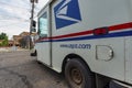 GRAND LEDGE, UNITED STATES - Jun 21, 2020: Side View of USPS Delivery Vehicle