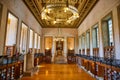 Grand Library Interior with Chandelier and Staircase Perspective