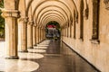 Grand marble colonnade with shadows and ornate columns - perspective