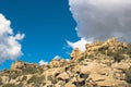 Craggy cliffs and a small waterfall atop Grand Mesa