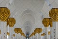 Grand Mosque large tall hallway of elegant gold decoration in Abu Dhabi, United Arab Emirates