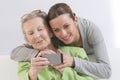 Grand-Mother and attractive young grand-daughter photographing t Royalty Free Stock Photo