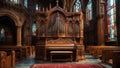 Grand old cathedral with high rising ceilings adorned with gothic styled sculptures and pipe organ Royalty Free Stock Photo