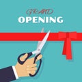 Grand opening. Scissors cut red ribbon