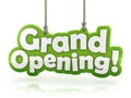 Grand Opening text hanging on white background