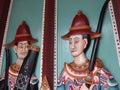 The Grand palace BANGKOK THAILAND-22 MAY 2019:Antique wooden figurines, ancient guards at the door of the Grand Palace.on BANGKOK