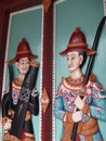 The Grand palace BANGKOK THAILAND-22 MAY 2019:Antique wooden figurines, ancient guards at the door of the Grand Palace.on BANGKOK