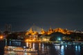 Grand palace and cruise ship in night ,Bangkok city ,Thailand Royalty Free Stock Photo