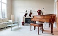 Grand piano with Christmas decorations during the holiday season Royalty Free Stock Photo