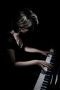 Grand piano player. Pianist playing piano concert Royalty Free Stock Photo