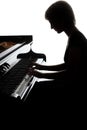 Grand piano player. Pianist woman playing piano Royalty Free Stock Photo