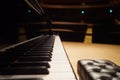 Grand Piano and seat in Concert Hall, close-up Royalty Free Stock Photo