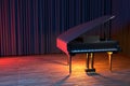 Grand Piano on the stage of concert hall or small jazz club Royalty Free Stock Photo