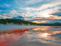 Grand Prismatic Spring under sunset cloudscape in the Midway Geyser Basin in Yellowstone National Park in Wyoming Royalty Free Stock Photo