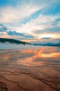 Grand Prismatic Spring under sunset cloudscape in the Midway Geyser Basin in Yellowstone National Park in Wyoming Royalty Free Stock Photo